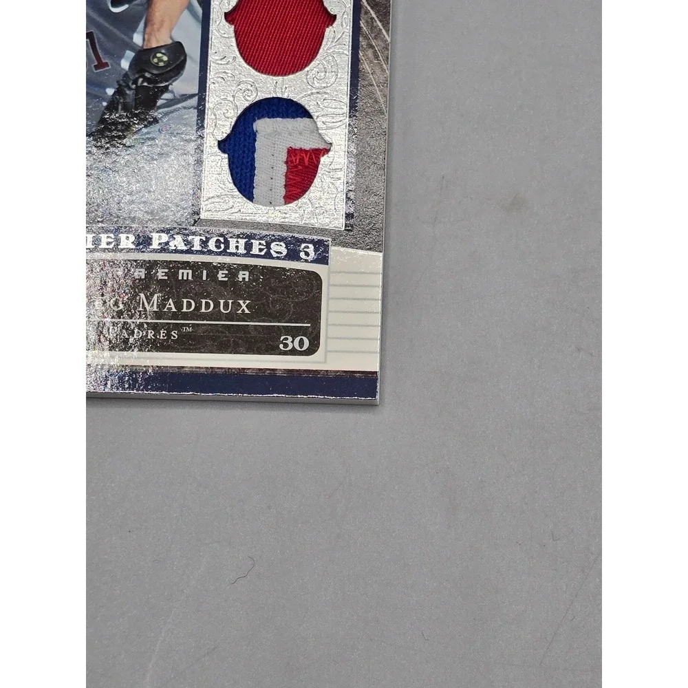2007 Upper‎ Deck Premier Patches Greg Maddux Triple Relic Jersey 76/87 Padres